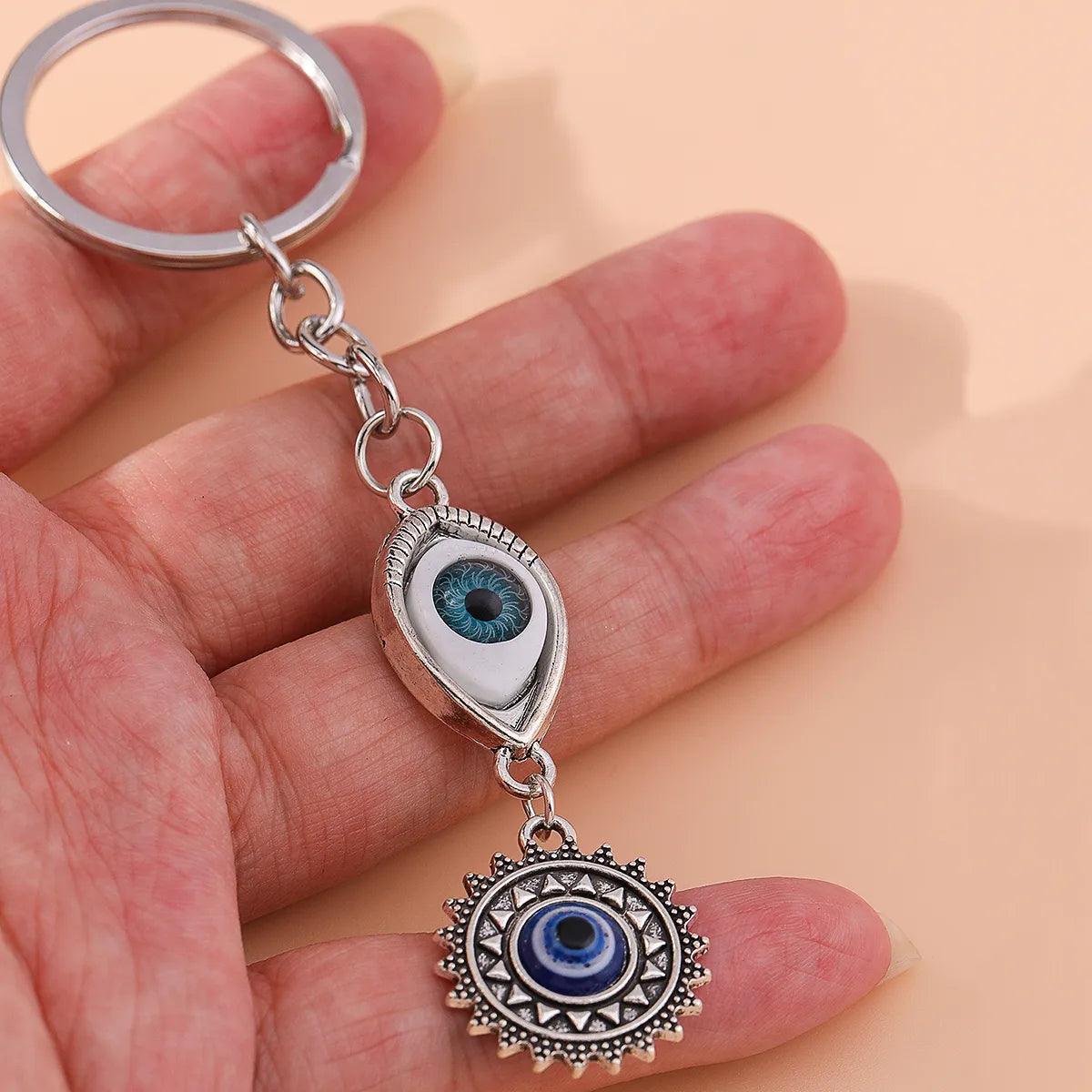 Retro Sun Eye Alloy Bag Pendant Keychain