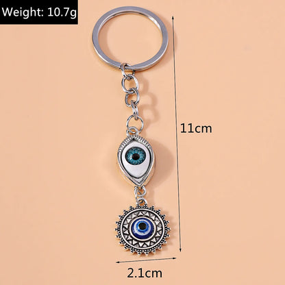 Retro Sun Eye Alloy Bag Pendant Keychain