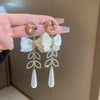 1 Pair Retro Tassel Flower Plating Inlay Alloy Artificial Pearls Rhinestones Drop Earrings