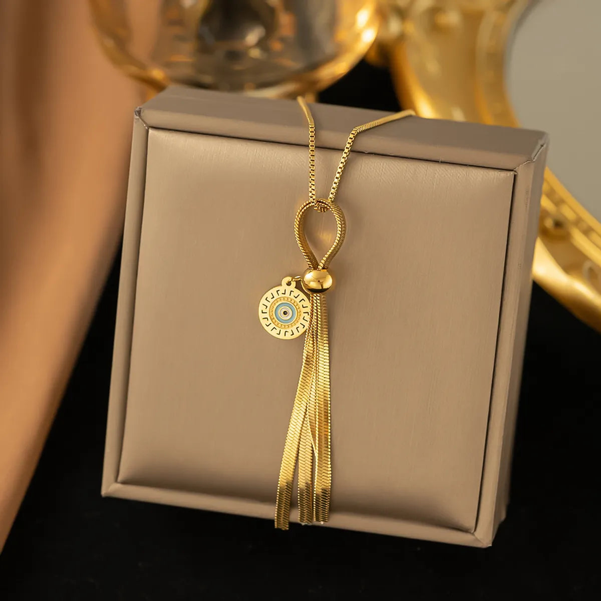 Roman Style Devil's Eye Tassel Titanium Steel 18k Gold Plated Artificial Diamond Pendant Necklace In Bulk