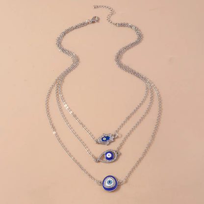 Shiny Devil's Eye Zircon Zinc Alloy Wholesale Layered Necklaces