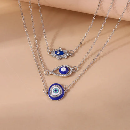 Shiny Devil's Eye Zircon Zinc Alloy Wholesale Layered Necklaces