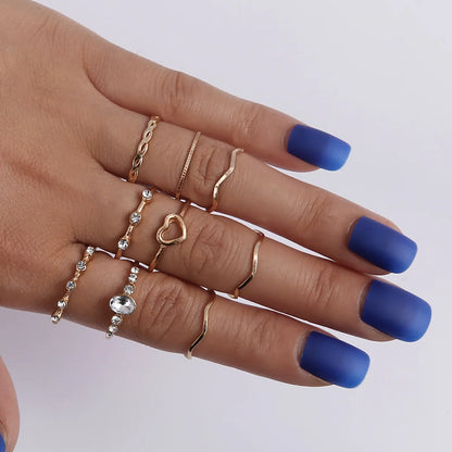 Simple Hollow Geometric Wave Shape Alloy Plating Ring 9 Sets