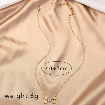 Simple Style Bow And Arrow Alloy Plating Inlay Rhinestones Gold Plated Women'S Pendant Necklace