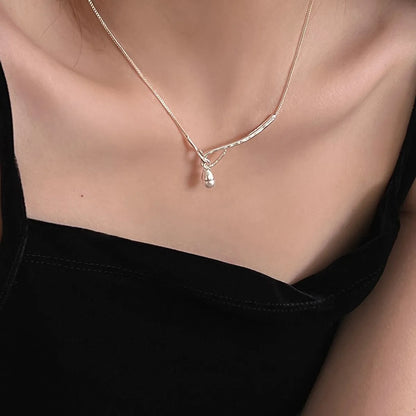 Simple Style Bow Knot Copper Plating Inlay Artificial Gemstones Women'S Pendant Necklace