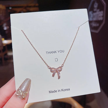 Simple Style Bow Knot Titanium Steel Inlay Zircon Pendant Necklace