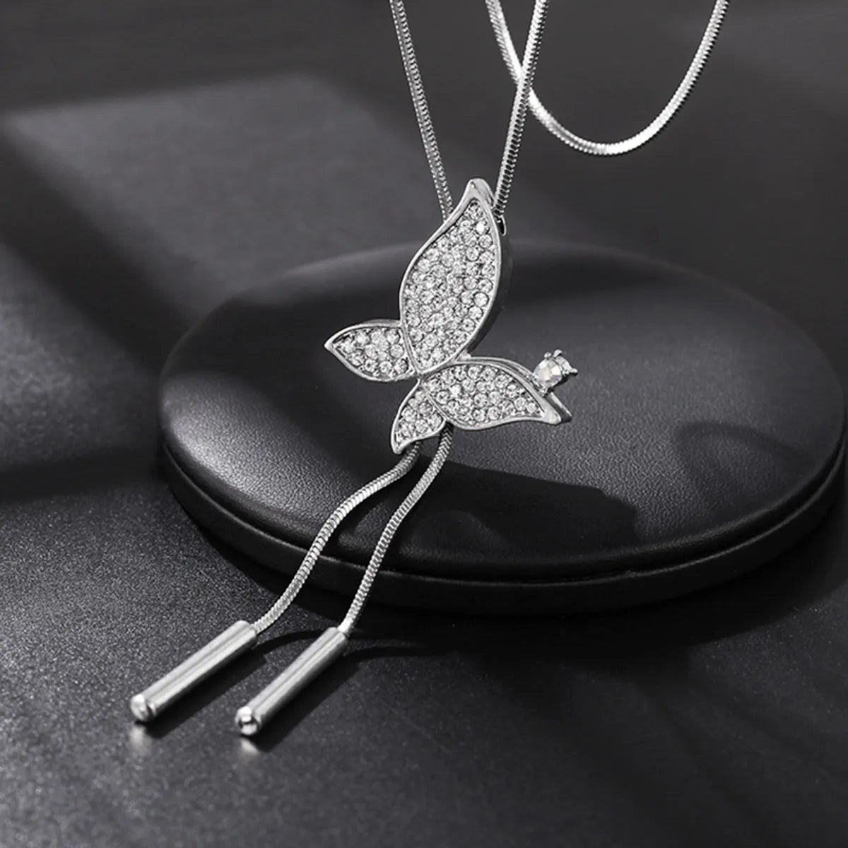 Simple Style Butterfly Alloy Copper Inlay Glass Women'S Sweater Chain Long Necklace