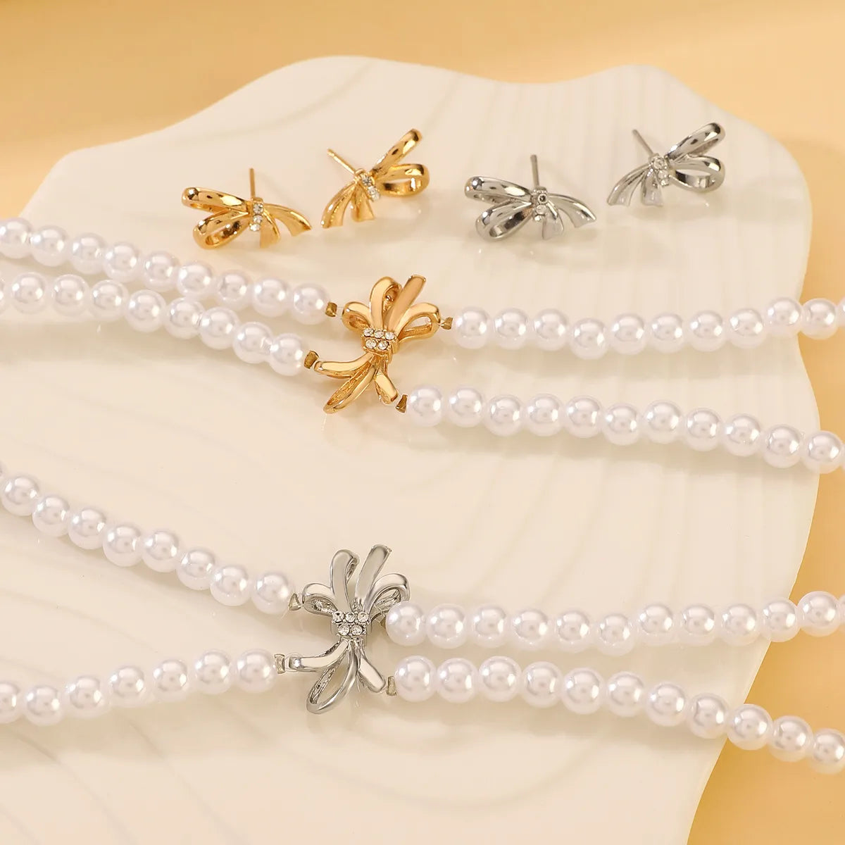 Simple Style Classic Style Bow Knot Imitation Pearl Alloy Beaded Women'S Jewelry Set