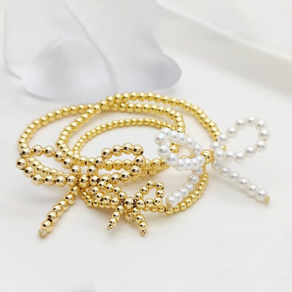 Simple Style Classic Style Bow Knot Imitation Pearl Copper Wholesale Bracelets