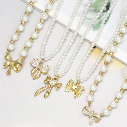 Simple Style Classic Style Bow Knot Imitation Pearl Copper Wholesale Pendant Necklace