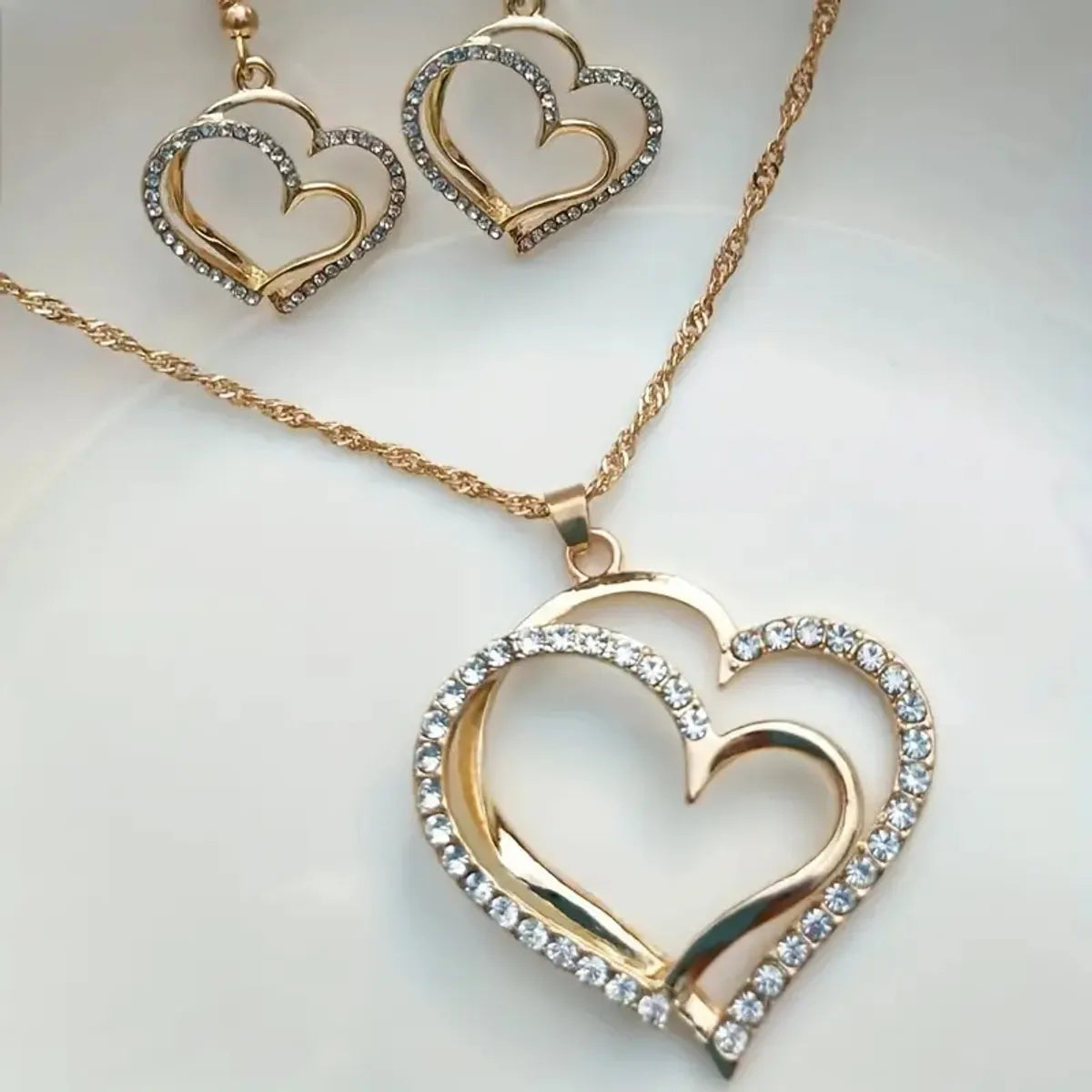 Simple Style Classic Style Double Heart Heart Shape Alloy Inlay Rhinestones Gold Plated Silver Plated Women'S Bracelets Earrings Necklace