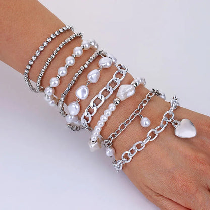 Simple Style Classic Style Heart Shape ABS Imitation Pearl Alloy Wholesale Bracelets