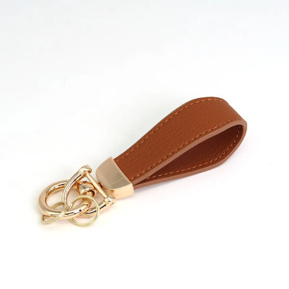 Simple Style Classic Style Solid Color Pu Leather Alloy Unisex Bag Pendant Keychain