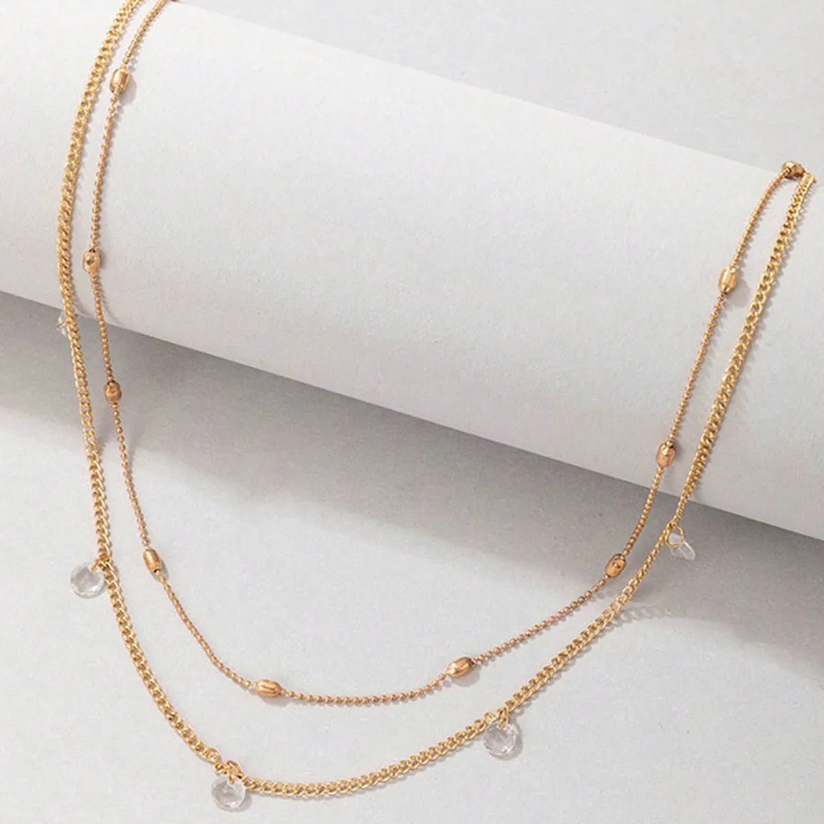 Simple Style Commute Solid Color Alloy Wholesale Layered Necklaces