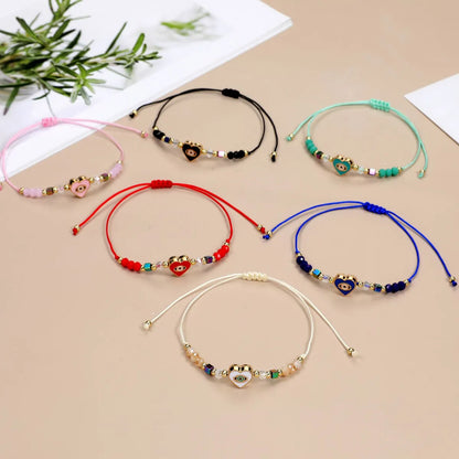 Simple Style Devil's Eye Heart Shape Artificial Crystal Alloy Rope Knitting Enamel Unisex Bracelets