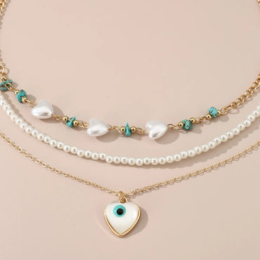 Simple Style Devil's Eye Heart Shape Turquoise Imitation Pearl Alloy Metal Wholesale Necklace