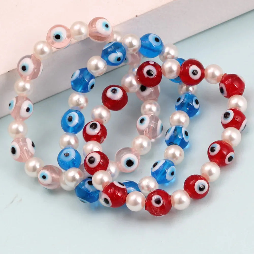 Simple Style Devil'S Eye Imitation Pearl Glass Wholesale Bracelets