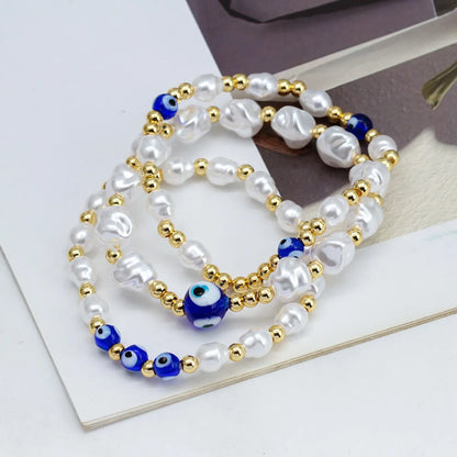 Simple Style Eye Artificial Pearl Copper Wholesale Bracelets