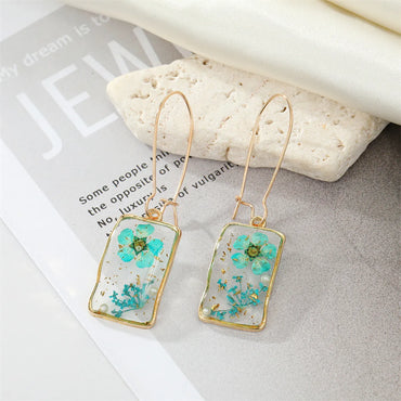 Simple Style Flower Synthetic Resin Alloy Epoxy Transparent Women's Dangling Earrings 1 Pair