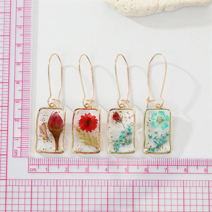 Simple Style Flower Synthetic Resin Alloy Epoxy Transparent Women's Dangling Earrings 1 Pair