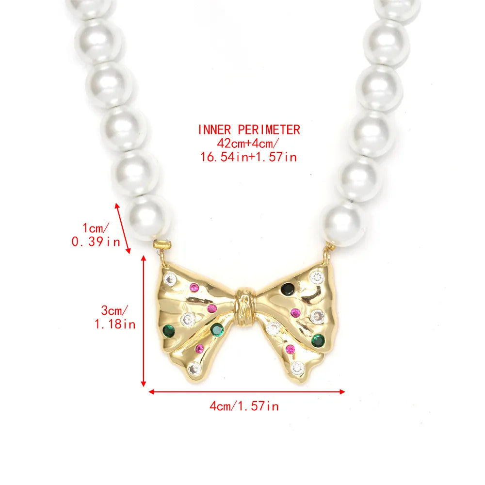 Simple Style Geometric Heart Shape Bow Knot Zircon Imitation Pearl Copper Wholesale Necklace