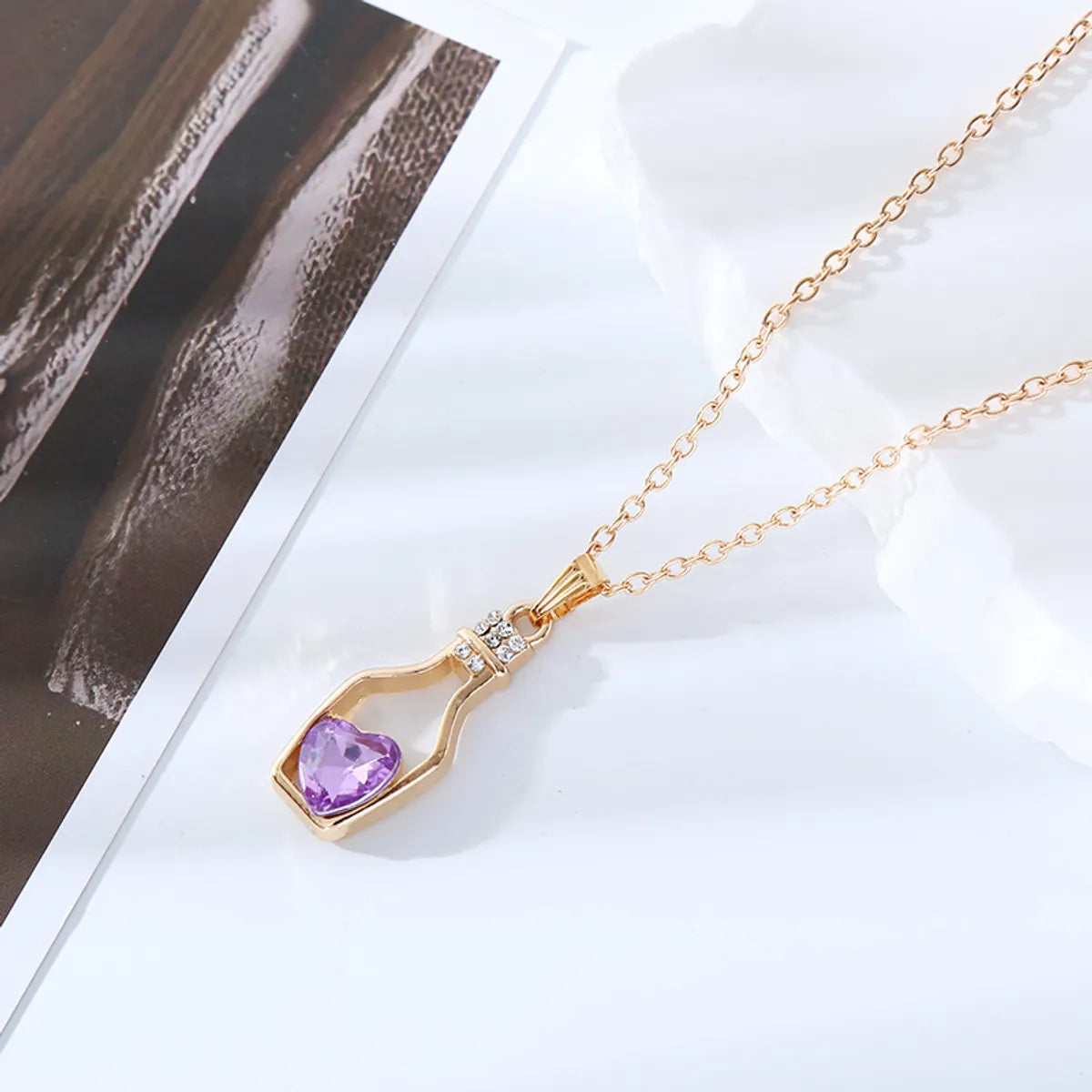 Simple Style Heart Shape Bottle Alloy Plating Inlay Artificial Crystal Women'S Pendant Necklace