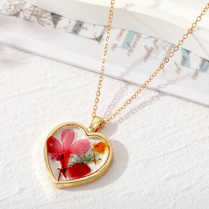 Simple Style Heart Shape Flower Alloy Epoxy Women'S Pendant Necklace 1 Piece