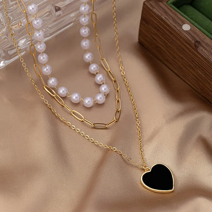 Simple Style Heart Shape Plastic Zinc Alloy Women's Three Layer Necklace