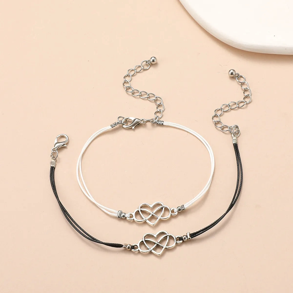 Simple Style Infinity Heart Shape Alloy Wax Line Plating Hollow Out Couple Bracelets