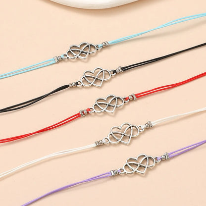 Simple Style Infinity Heart Shape Alloy Wax Line Plating Hollow Out Couple Bracelets