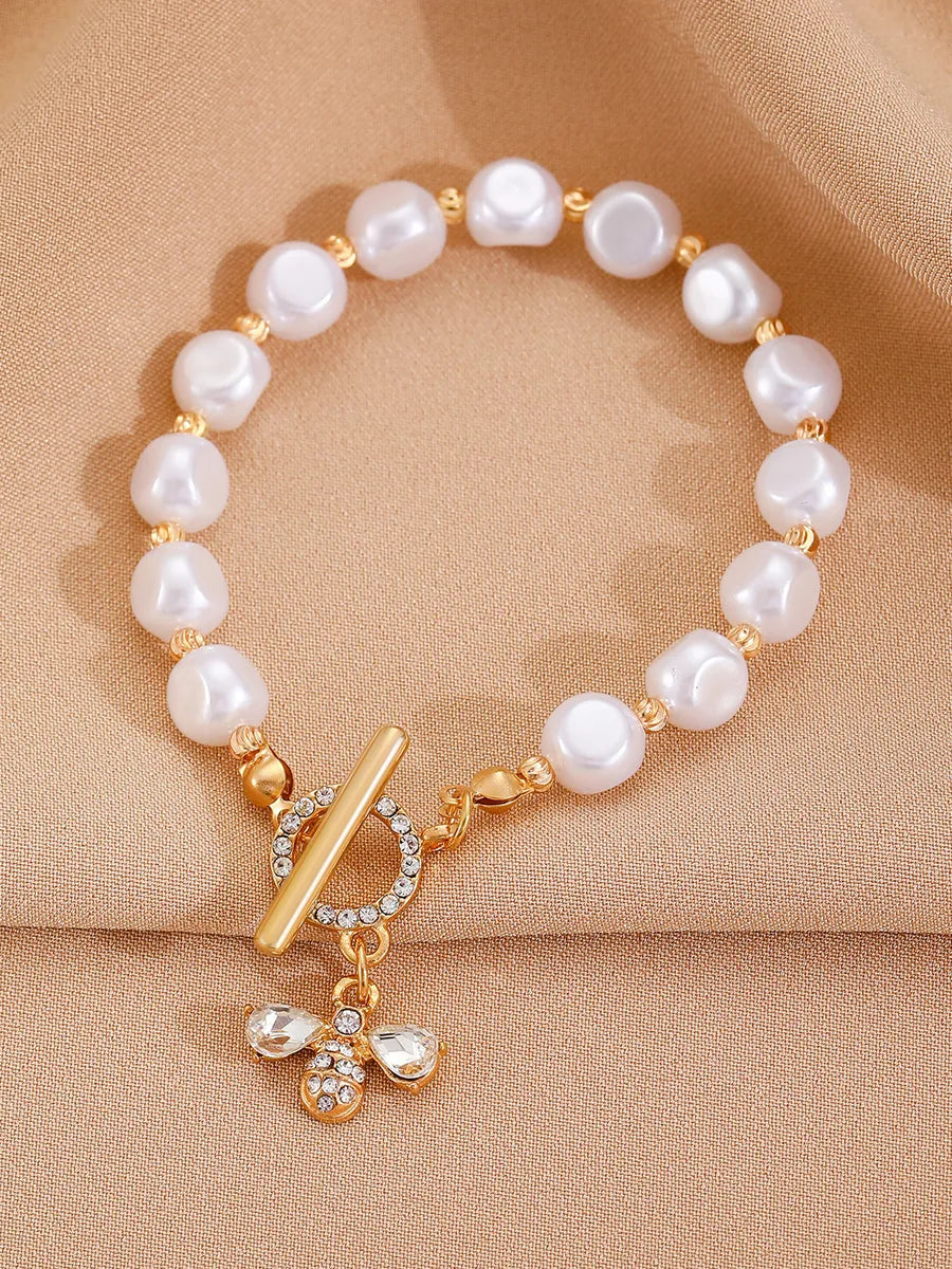 Simple Style Moon Flower Bow Knot Imitation Pearl Alloy Wholesale Bracelets