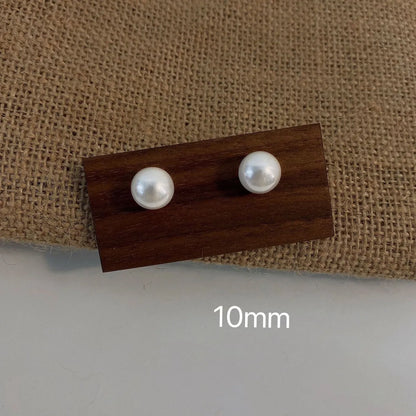 Simple Style Pearl Alloy Stoving Varnish Artificial Pearls Women'S Ear Studs 1 Pair