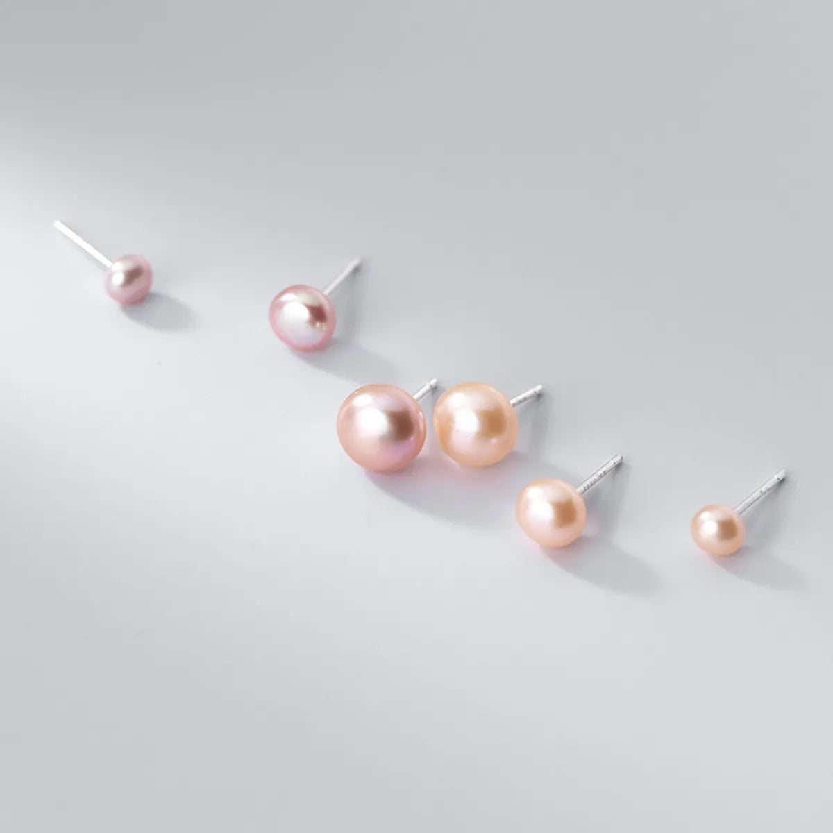 Simple Style Round Silver Pearl Ear Studs 1 Pair