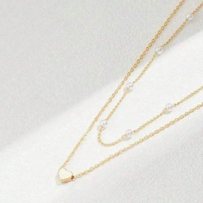 Simple Style Solid Color Alloy Wholesale Layered Necklaces