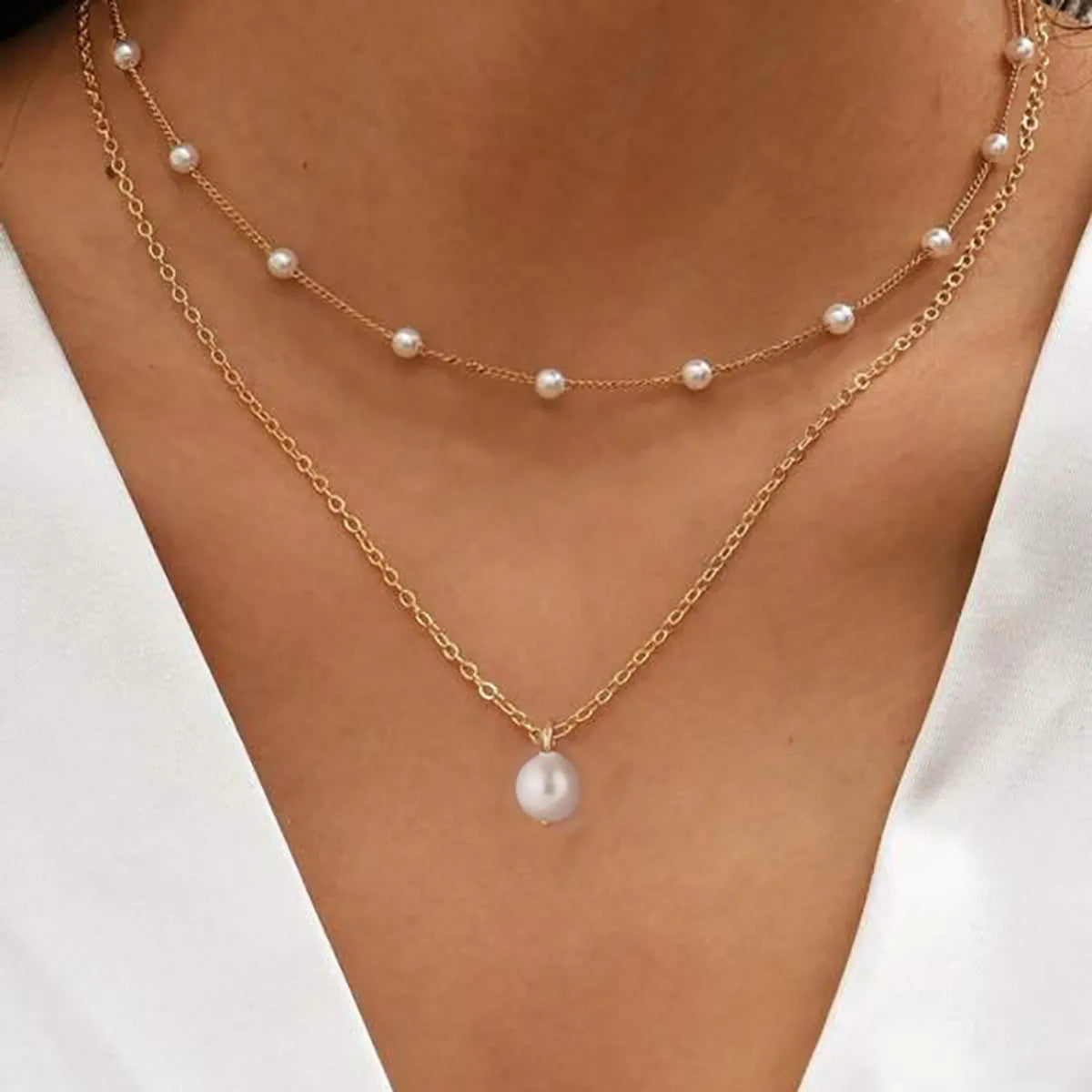 Simple Style Solid Color Alloy Wholesale Layered Necklaces