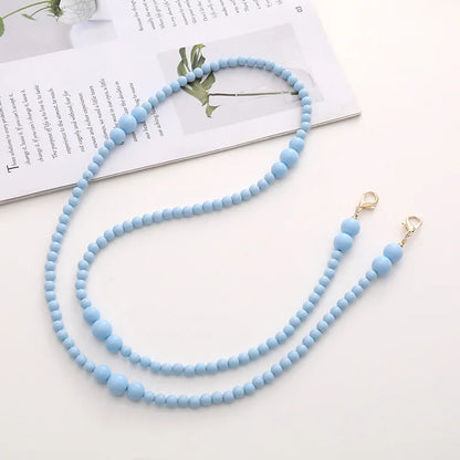 Simple Style Solid Color Bow Knot Arylic Nylon Beaded Mobile Phone Chain