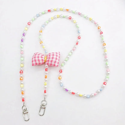 Simple Style Solid Color Bow Knot Arylic Nylon Beaded Mobile Phone Chain