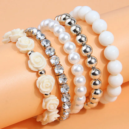 Simple Style Solid Color Flower Ccb Arylic Beaded Women's Bracelets