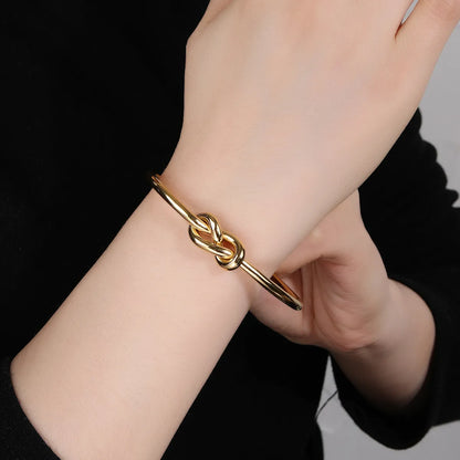 Stainless Steel 14K Gold Plated Vintage Style Simple Style Solid Color Knot Bangle