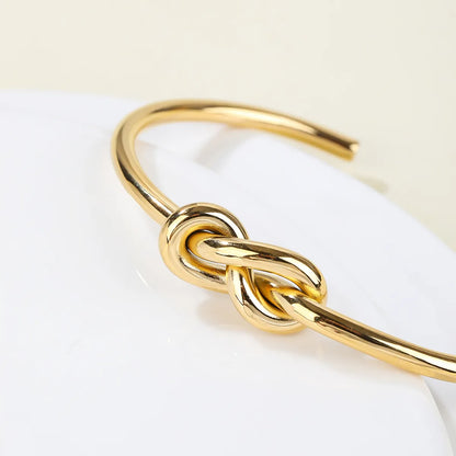 Stainless Steel 14K Gold Plated Vintage Style Simple Style Solid Color Knot Bangle