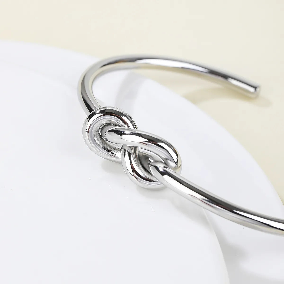 Stainless Steel 14K Gold Plated Vintage Style Simple Style Solid Color Knot Bangle