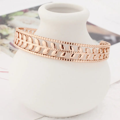 Stainless Steel 18K Gold Plated Rose Gold Plated Elegant Punk Shiny Leaves Hollow Out Bangle