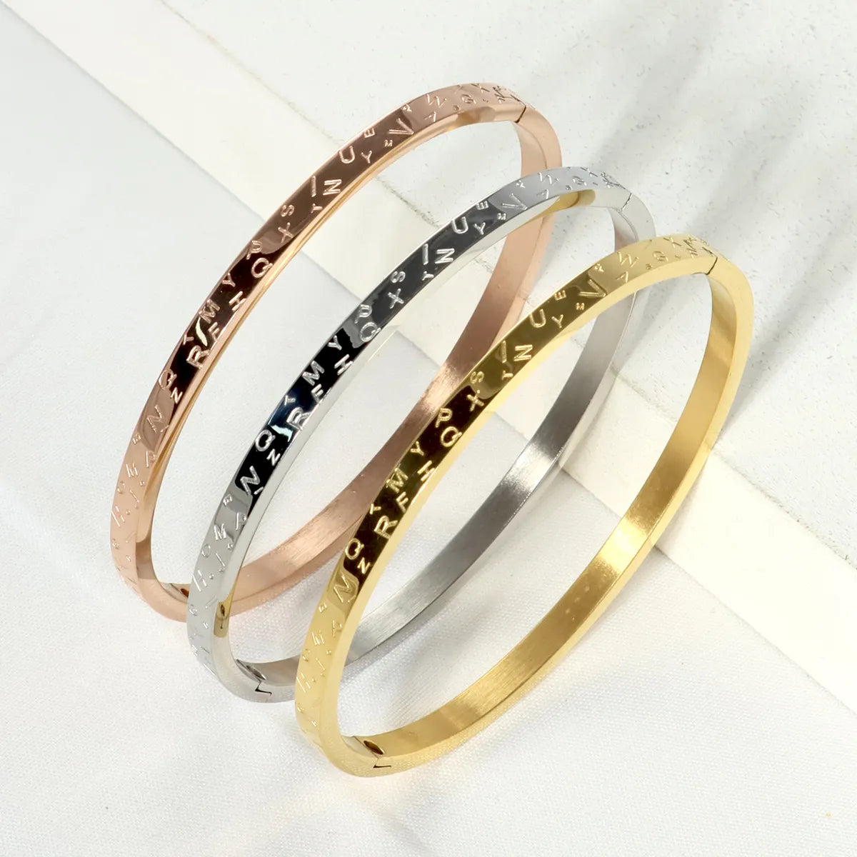 Stainless Steel Ig Style Elegant Simple Style Geometric Letter Electrocardiogram Plating Carving Bangle