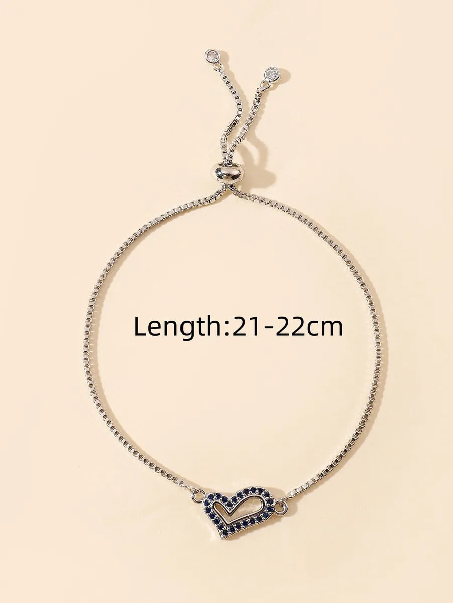 Stainless Steel Silver Plated Simple Style Classic Style Heart Shape Hollow Out Inlay Zircon Bracelets