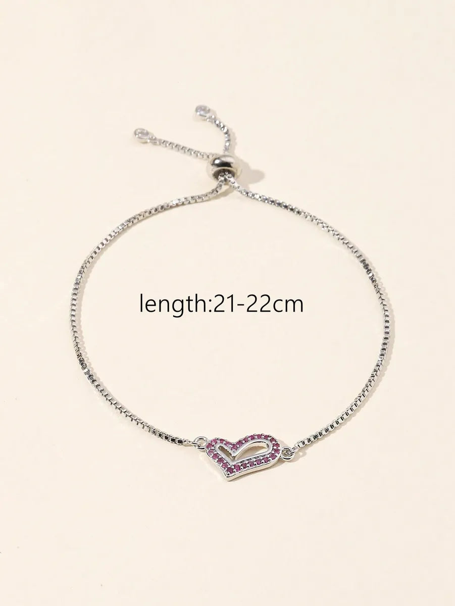 Stainless Steel Silver Plated Simple Style Classic Style Heart Shape Hollow Out Inlay Zircon Bracelets