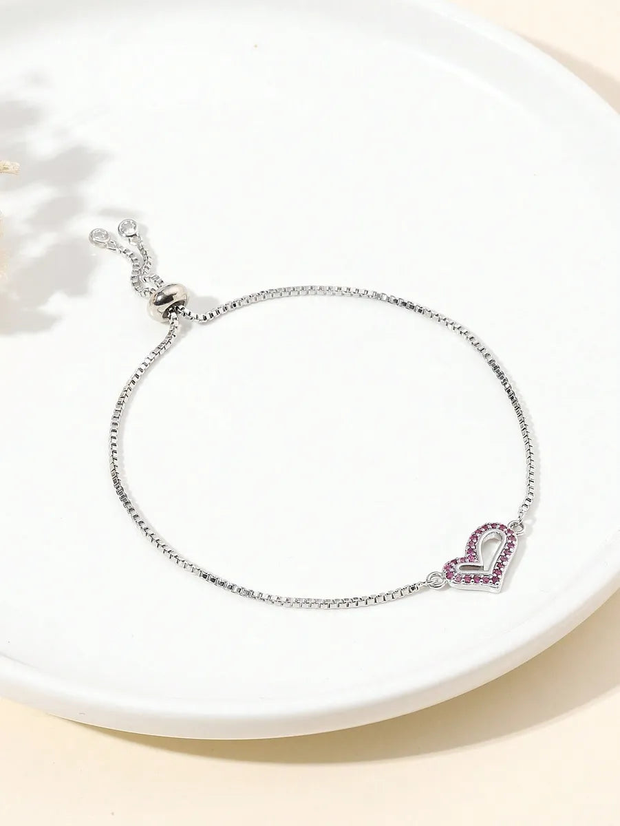 Stainless Steel Silver Plated Simple Style Classic Style Heart Shape Hollow Out Inlay Zircon Bracelets