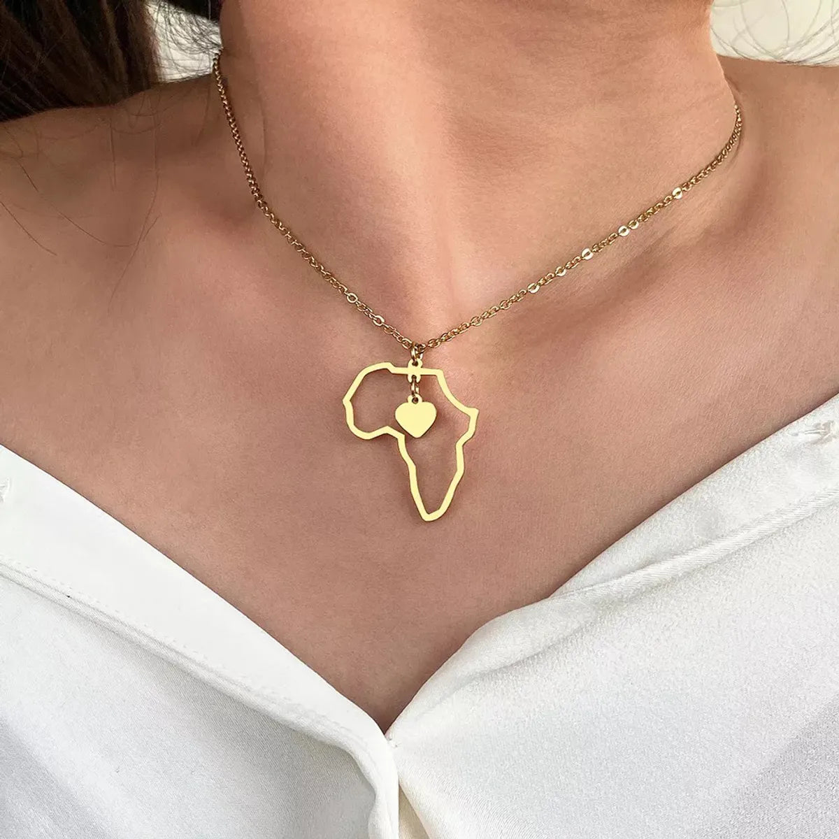 Stainless Steel Simple Style Streetwear Map Heart Shape Asymmetrical Hollow Out Pendant Necklace