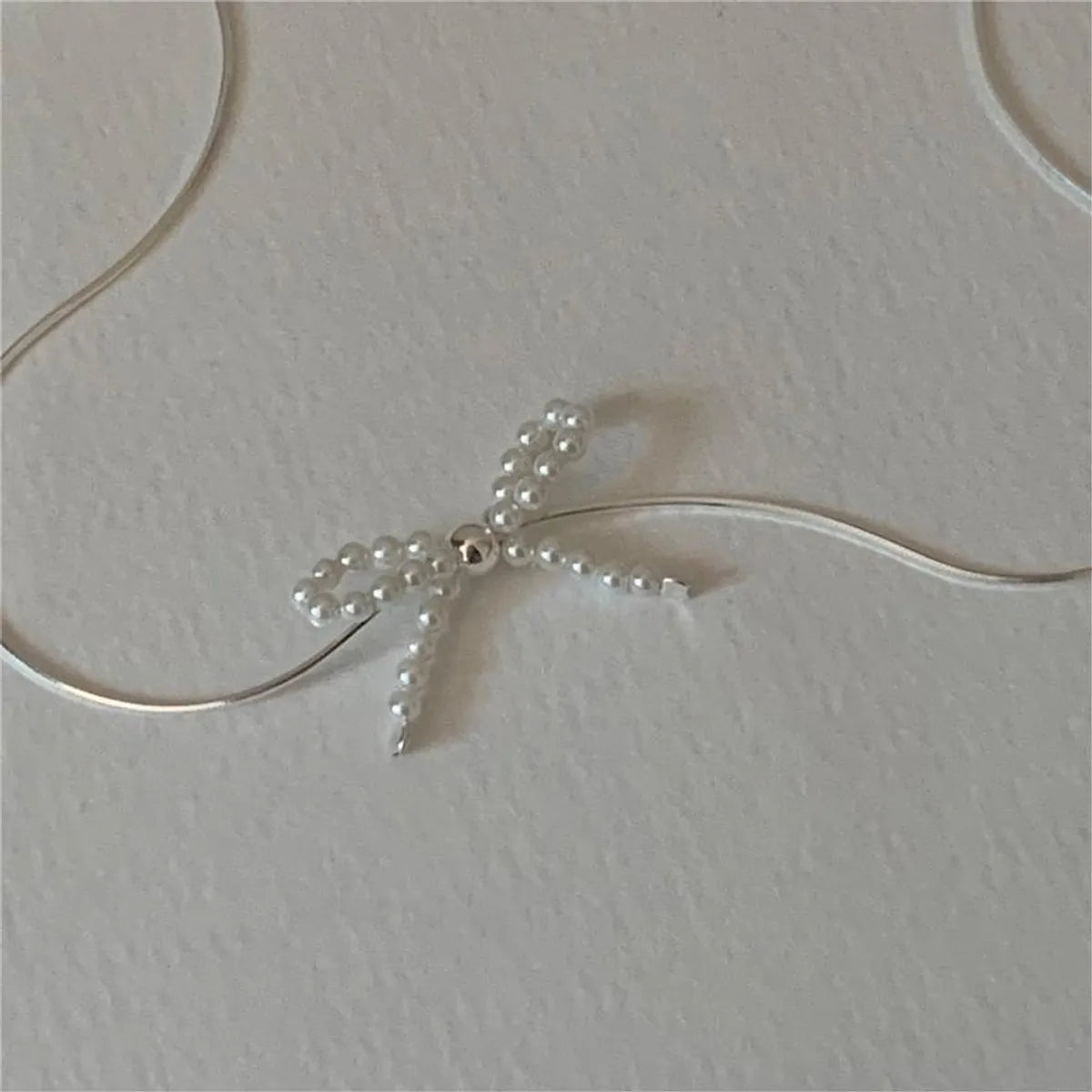 Sterling Silver Simple Style Bow Knot Pendant Necklace