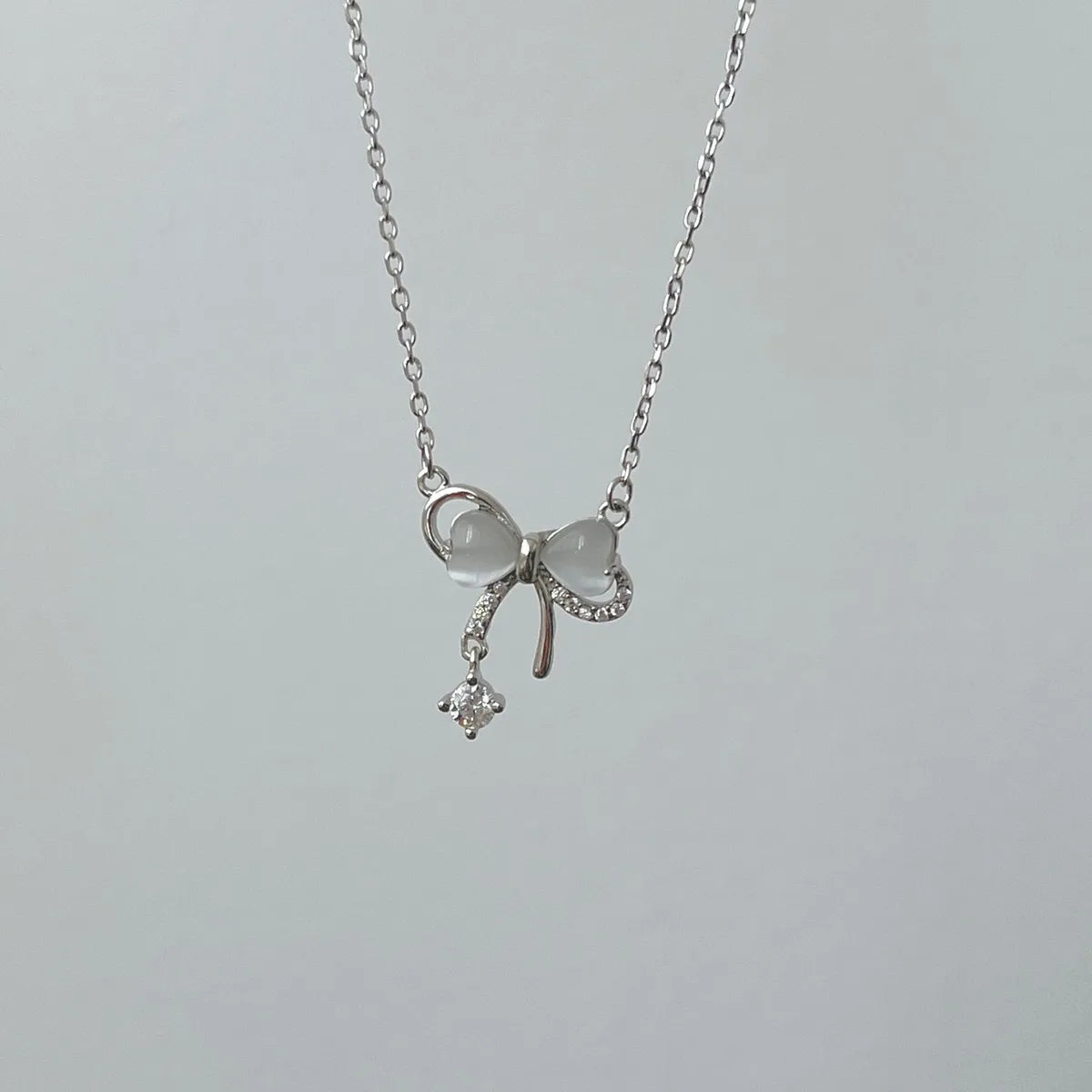 Sterling Silver Sweet Bow Knot Inlay Zircon Pendant Necklace