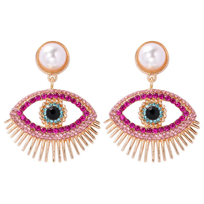 Streetwear Eye Imitation Pearl Alloy Plating Inlay Glass Stone Women'S Drop Earrings